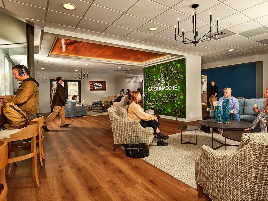 The lobby at Carolina Core Professional Center, with the Core Coffee bar and people at work